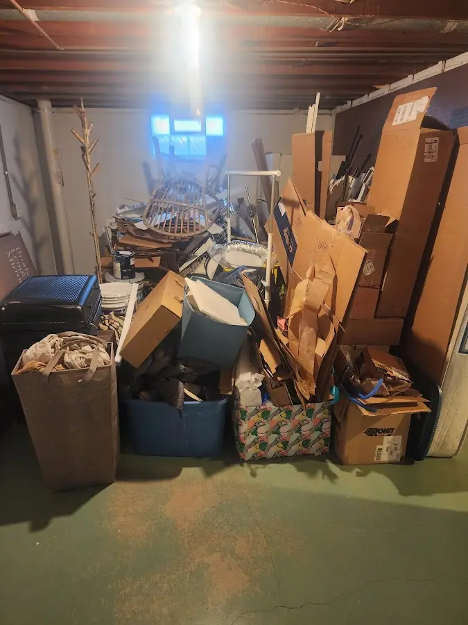 Roll-off dumpster container at job site for 4 Yard Dumpster Rental in Emerald Mountain